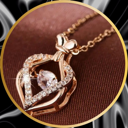 a beautiful rose golden heart shape hallow pendant necklace with small  crystals forming the heart shape and another big  diamond like stone (crystal) in the center of the heart.