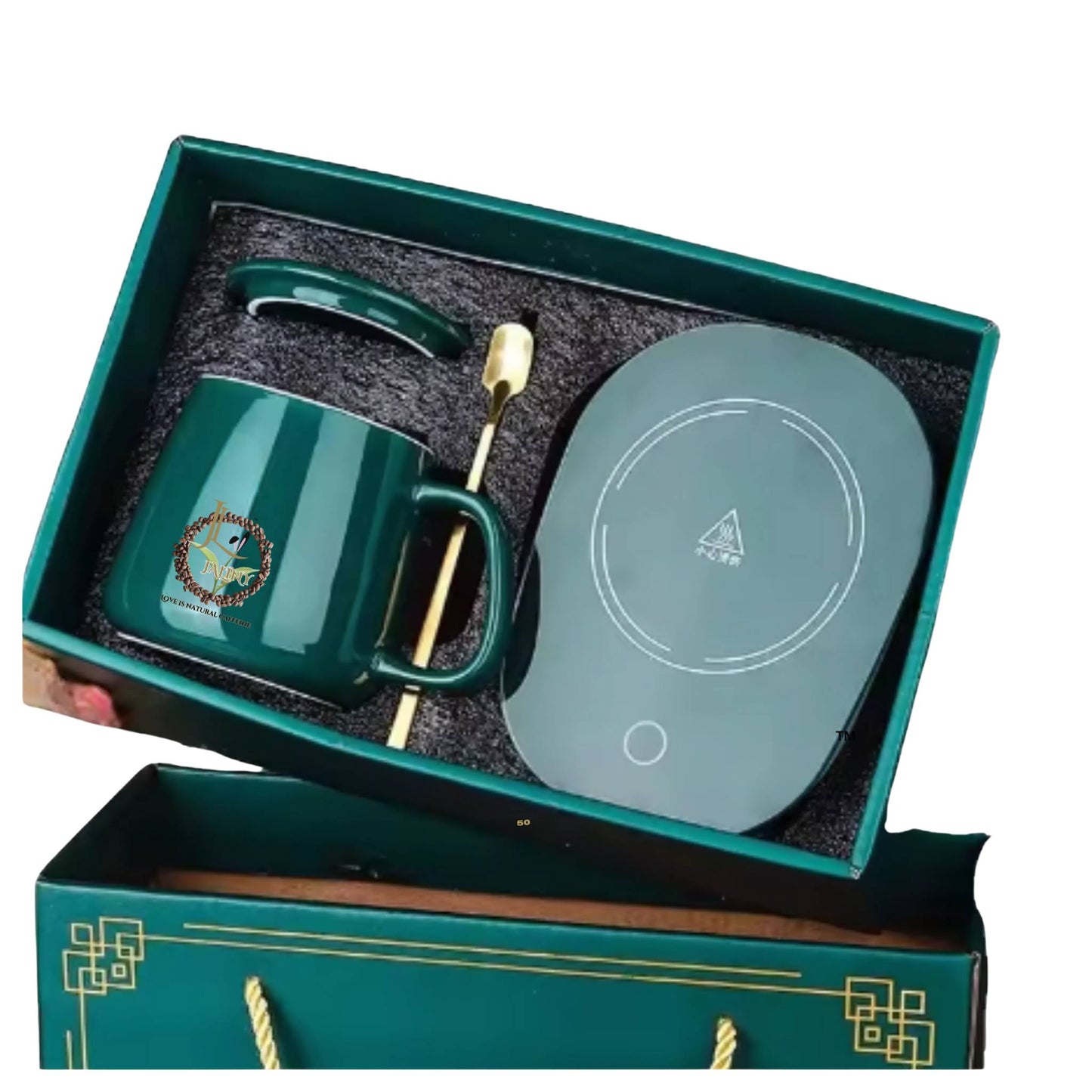 Beautiful green set gift box of coffee mug with heating pad and a golden spoon