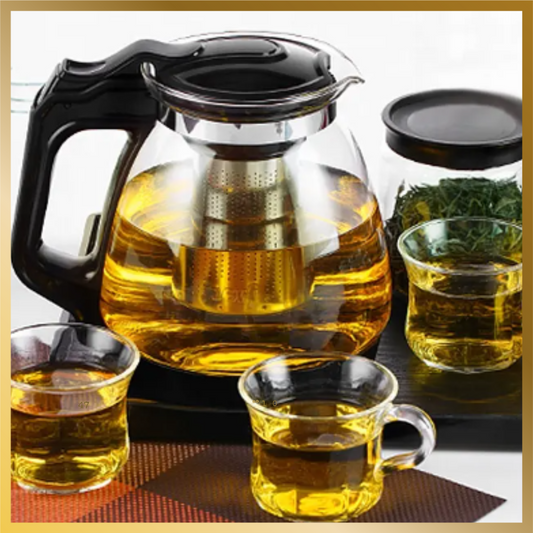 Glass tea kettle with stainless steel infuser  that is removable, safe for heat with black handle.