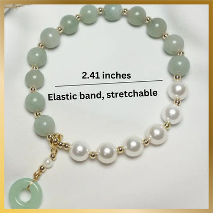 a beautiful half pearl half artificial jade with a charm elastic bracelet look so elegant.