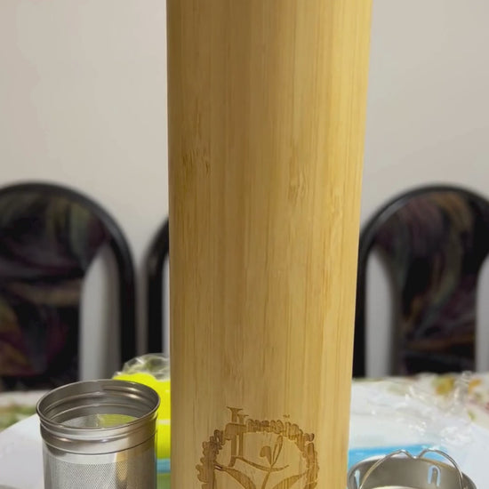 Video of bamboo tumbler with tea or coffee removable infuser