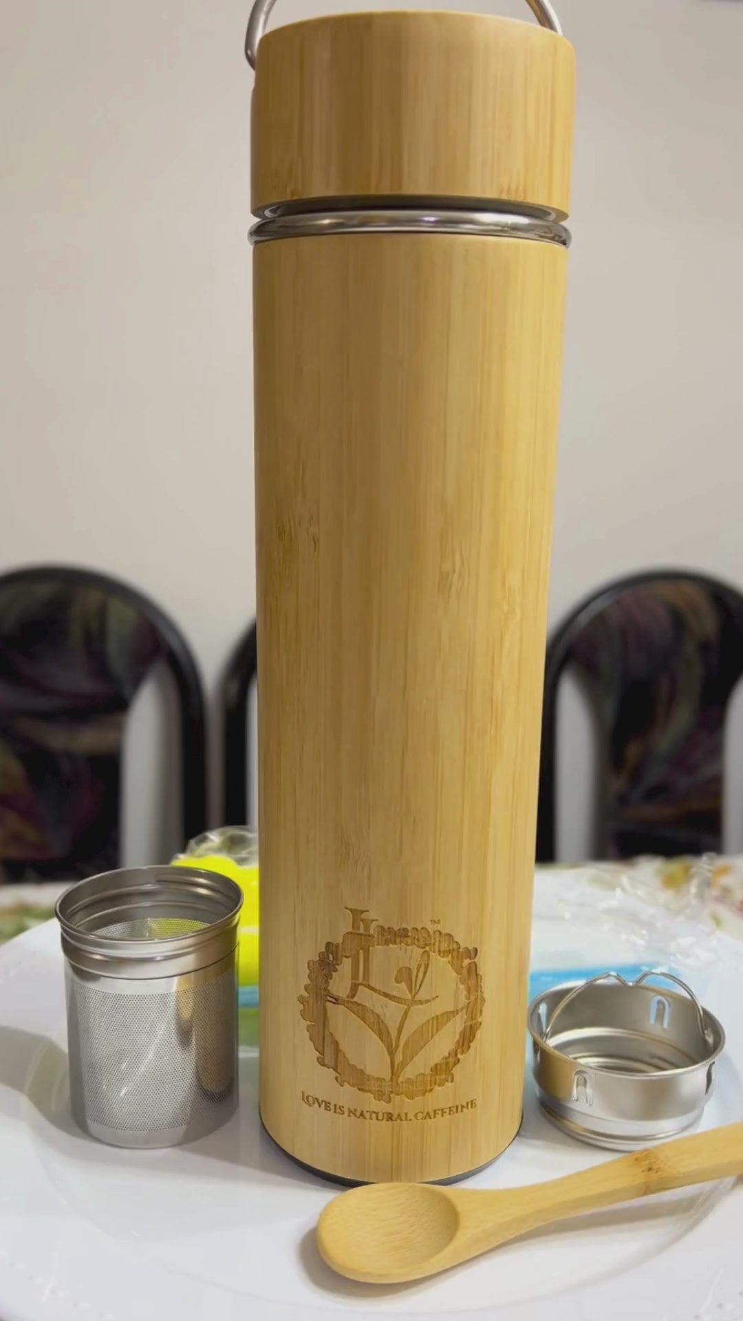 Video of bamboo tumbler with tea or coffee removable infuser